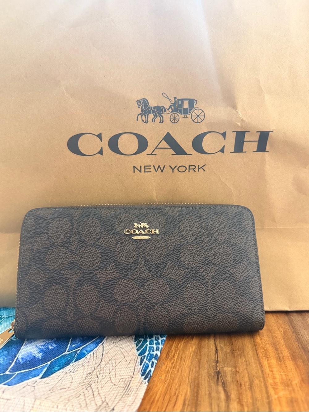 Coach Signature Continental Zip Wallet in Dark Brown